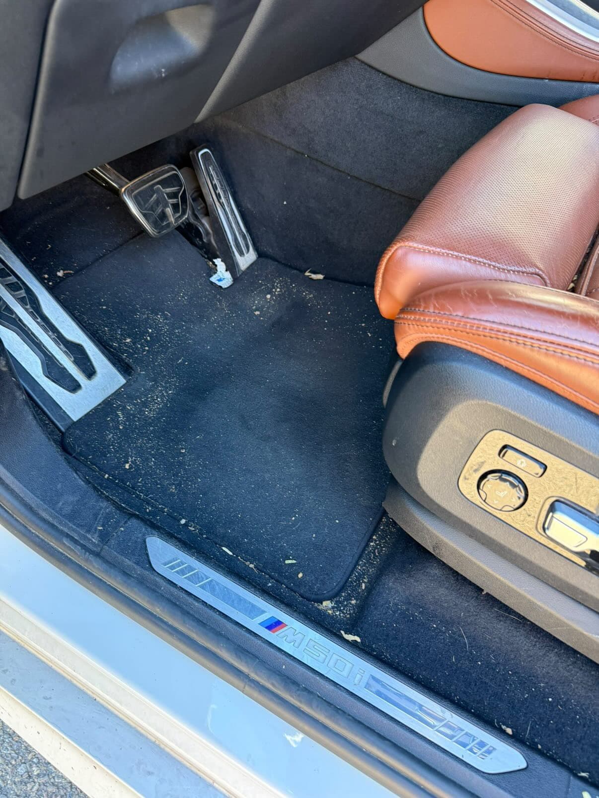 BMW M50i dirty floor carpet before detail